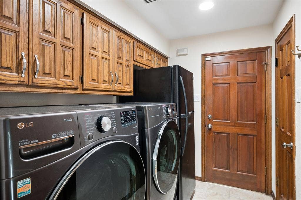 2001 Pebble Beach Court, Richardson, TX 75082 Utility room provides additional wall-closet/pantry for extra storage, room for extra fridge and direct access to the 2 car garage.