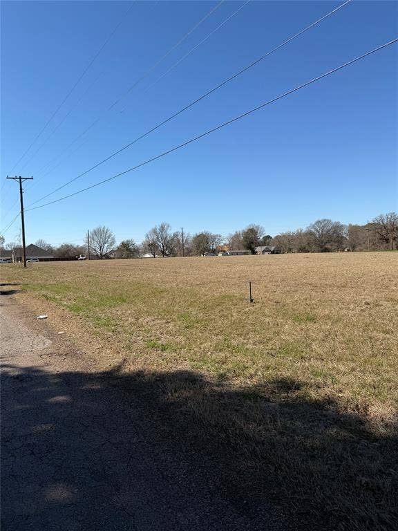 19198 Key Ranch Road, Trinidad, TX 75163 View of green lawn with a rural view
