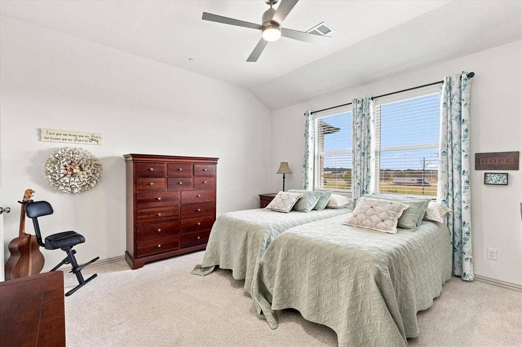 612 4th Street, Argyle, TX 76226 High ceilings with ceiling fan and plenty of room in this primary suite.