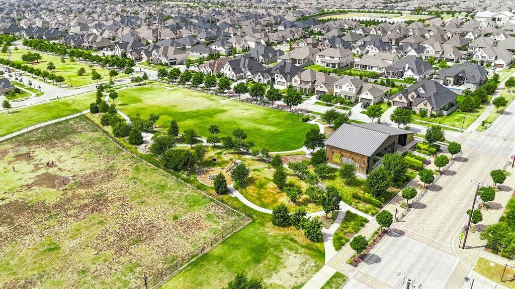 612 4th Street, Argyle, TX 76226 Community green space featuring a pavilion with a metal roof, landscaped grounds, and a paved pathway system