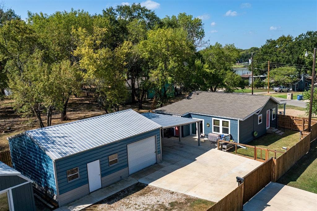 101 Merry Way, Gun Barrel City, TX 75156 Power gate with a 2-car carport, one car garage or shop to store your lake toys