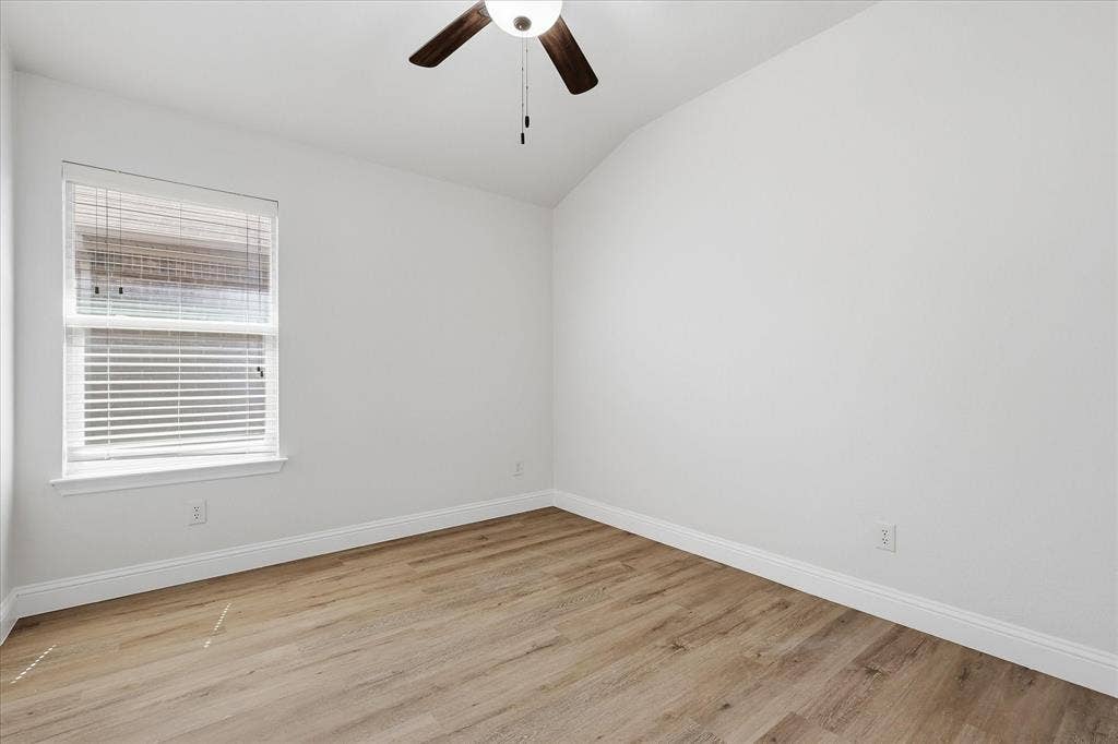4516 Remuda Lane, Denton, TX 76226 Vaulted ceiling, wood-finish flooring, ceiling fan, window with blinds