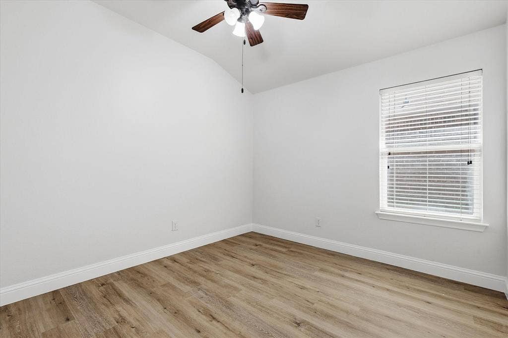 4516 Remuda Lane, Denton, TX 76226 Vaulted ceiling, wood-finish flooring, ceiling fan with integrated lighting, single window