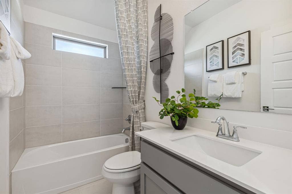 4705 Starlight Drive, McKinney, TX 75071 Bathroom in the Van Gogh II home plan by Trophy Signature Homes – REPRESENTATIVE PHOTO