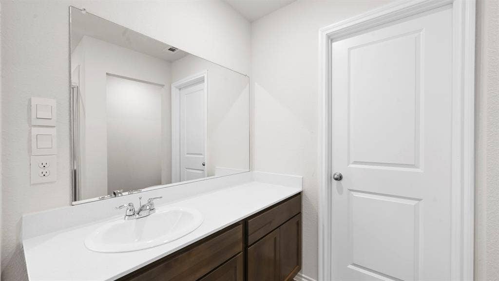 5614 Gannet Place, Crandall, TX 75114 White countertop with an integrated sink and chrome faucet