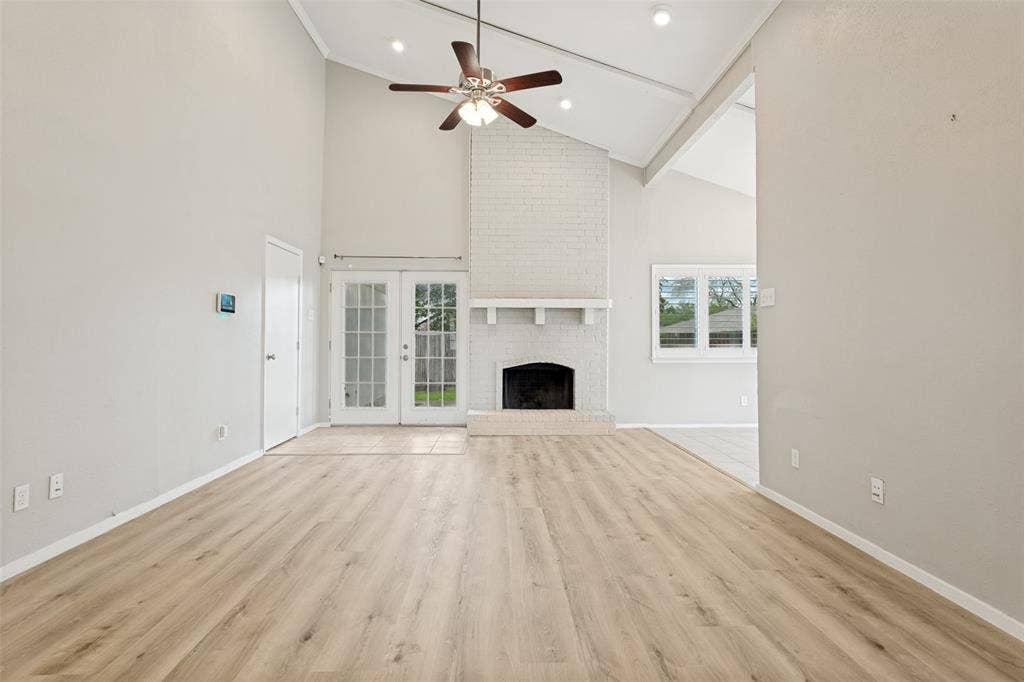 2117 Oak Brook Drive, Richardson, TX 75081 Wood burning fireplace and high ceilings