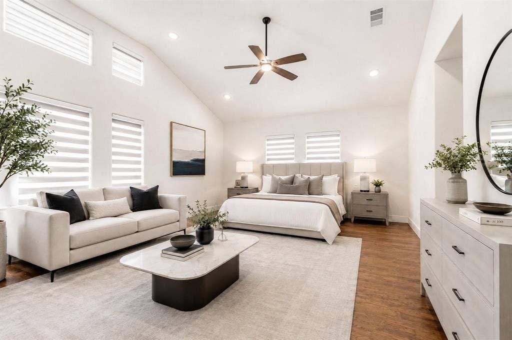 713 Wayne Street, Dallas, TX 75223 Vaulted ceiling with a ceiling fan, recessed lighting, wood-finish flooring, and multiple windows with blinds