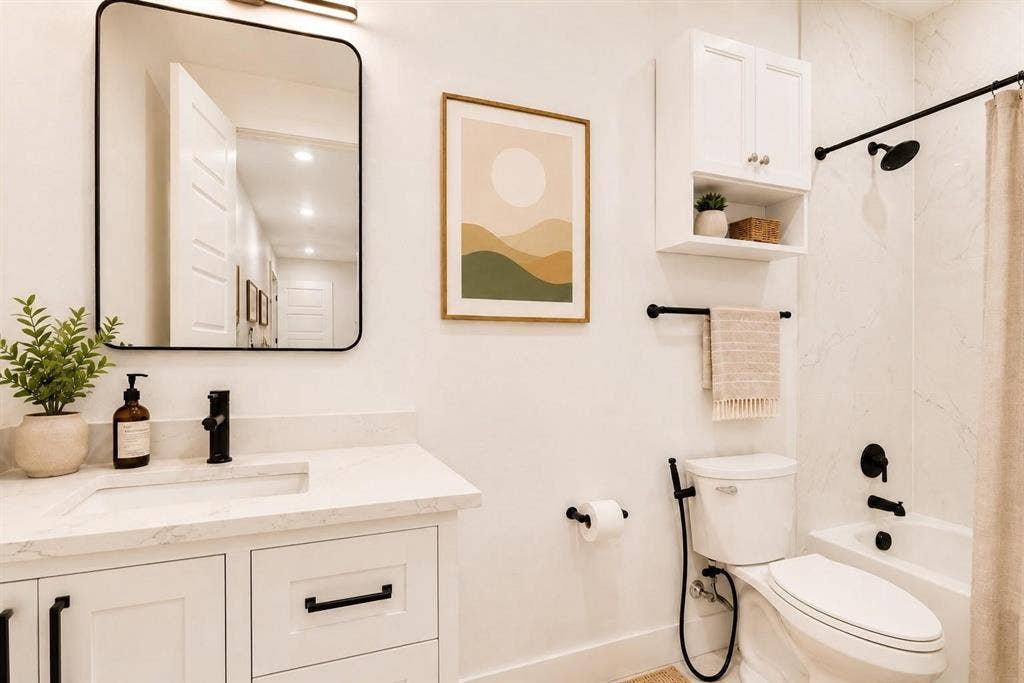 713 Wayne Street, Dallas, TX 75223 White shaker-style vanity with a light-colored countertop and a matte black faucet