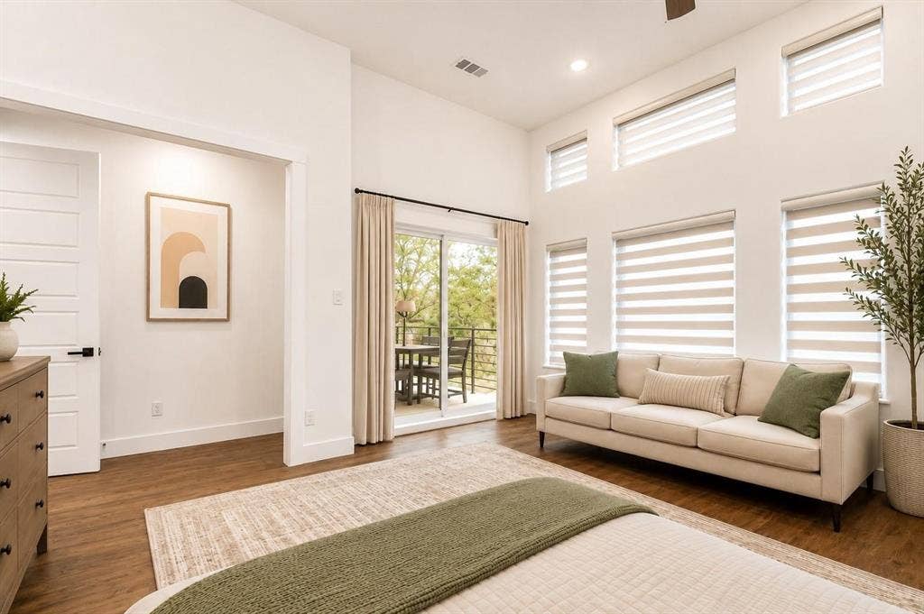 713 Wayne Street, Dallas, TX 75223 High ceilings, wood-finish flooring, sliding glass door, private balcony, and multiple windows with layered window treatments