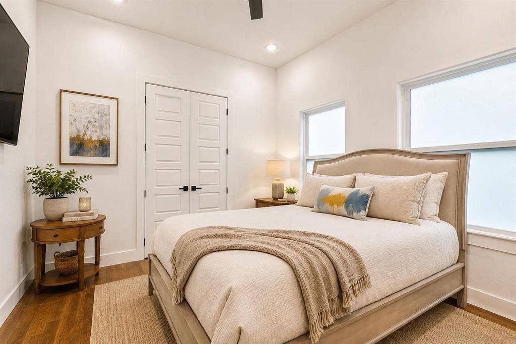 713 Wayne Street, Dallas, TX 75223 High ceilings, recessed lighting, wood-finish flooring, paneled double doors, and multiple windows