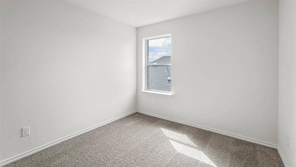 5606 Gannet Place, Crandall, TX 75114 Neutral-toned interior room featuring a single window and plush carpeting