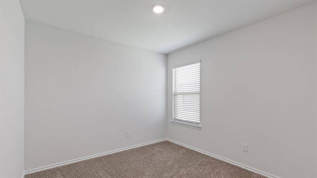 223 Yates Street, Bullard, TX 75757 Recessed ceiling lighting, a single window with blinds, and neutral wall tones
