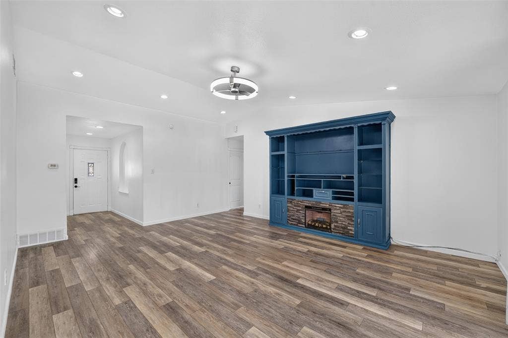 2130 Bowie Drive, Carrollton, TX 75006 Wood-finish flooring throughout, recessed ceiling lighting, and a modern ceiling fixture