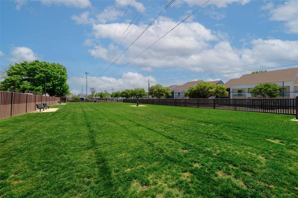 14616 Vintage Lane, Addison, TX 75001 Redding Trail Dog Park: wide-open fenced turf with room for a real game of fetch