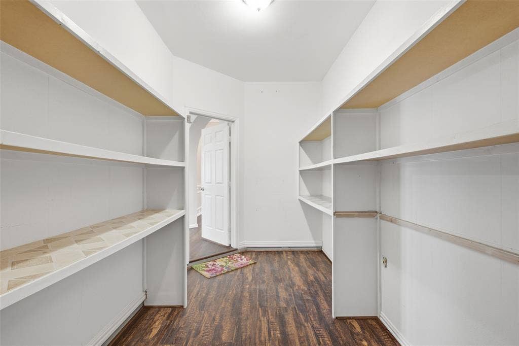 14616 Vintage Lane, Addison, TX 75001 Large storage room walk-in with floor-to-ceiling shelving plus hanging space