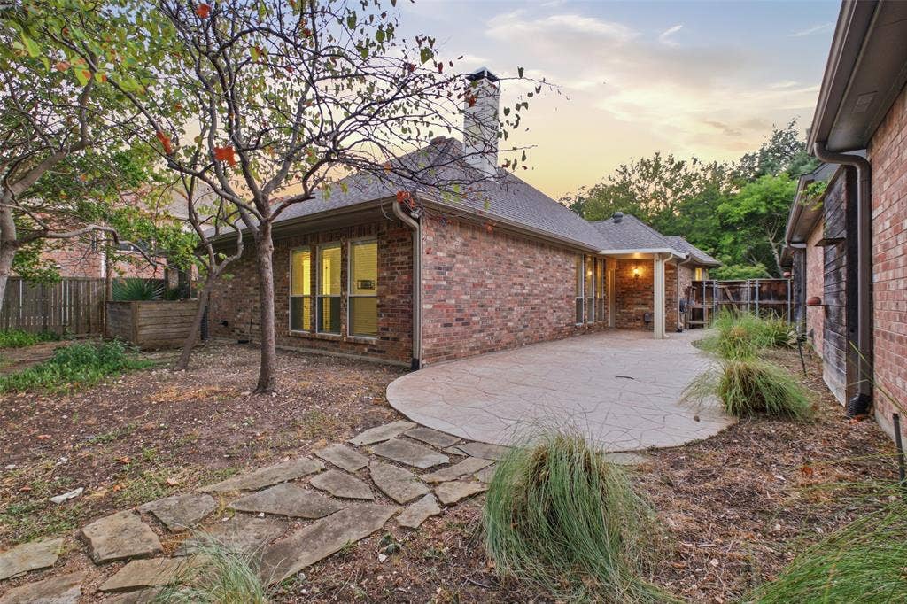 14616 Vintage Lane, Addison, TX 75001 Covered patio steps from the living room — shaded outdoor living you'll use nine months a year