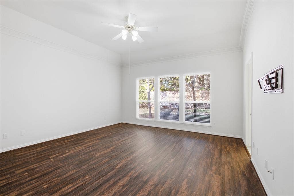 14616 Vintage Lane, Addison, TX 75001 Split primary retreat with a window wall to the greenbelt-style side yard and fresh flooring throughout