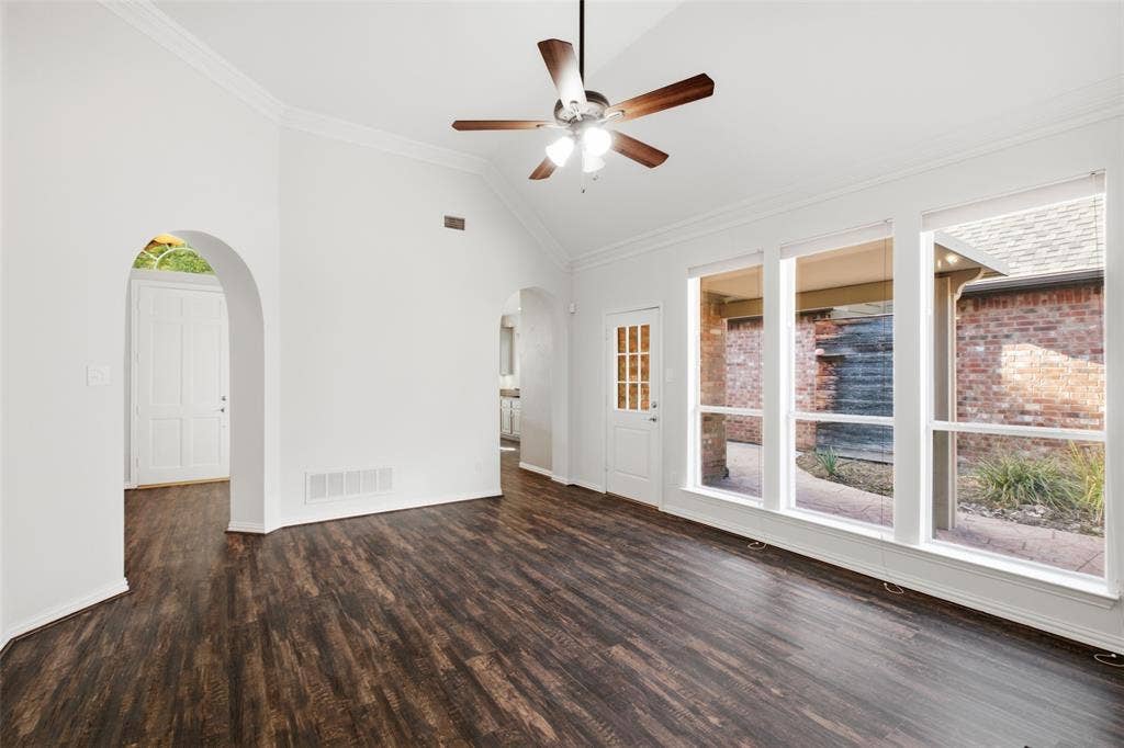 14616 Vintage Lane, Addison, TX 75001 The patio is one step away through the back door — indoor-outdoor living without a renovation