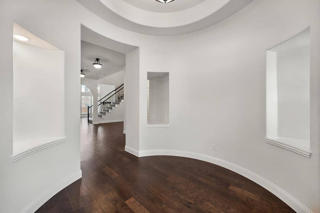5626 Rutherford Drive, Midlothian, TX 76065 Eye catching foyer as you walk through the front door.