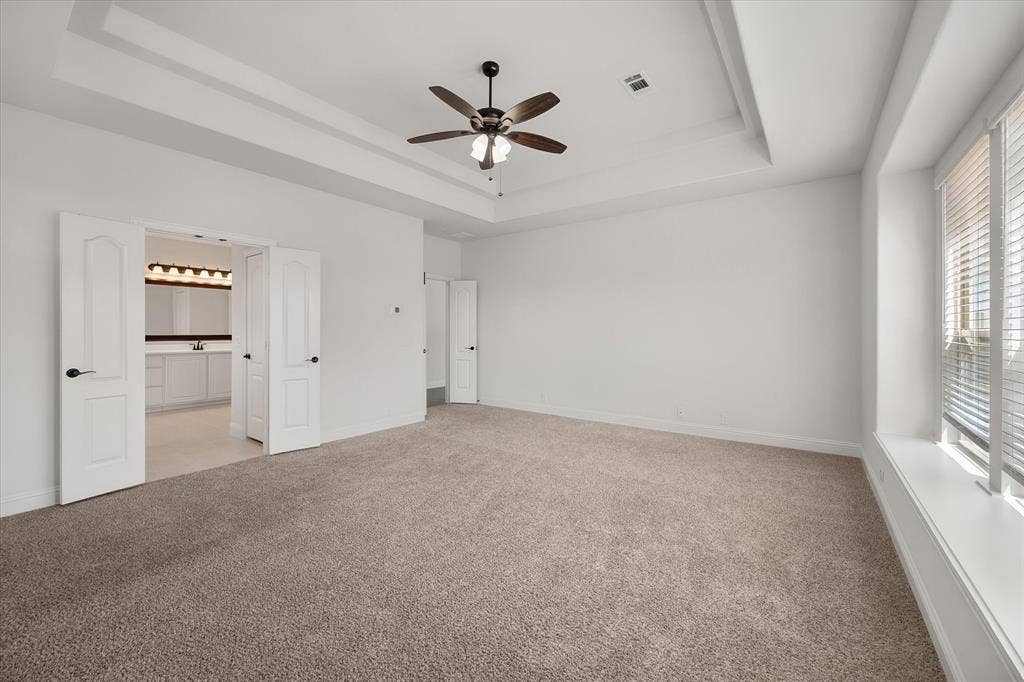 5626 Rutherford Drive, Midlothian, TX 76065 And from here you can see straight into the ensuite — this room really does feel like its own private wing of the house.