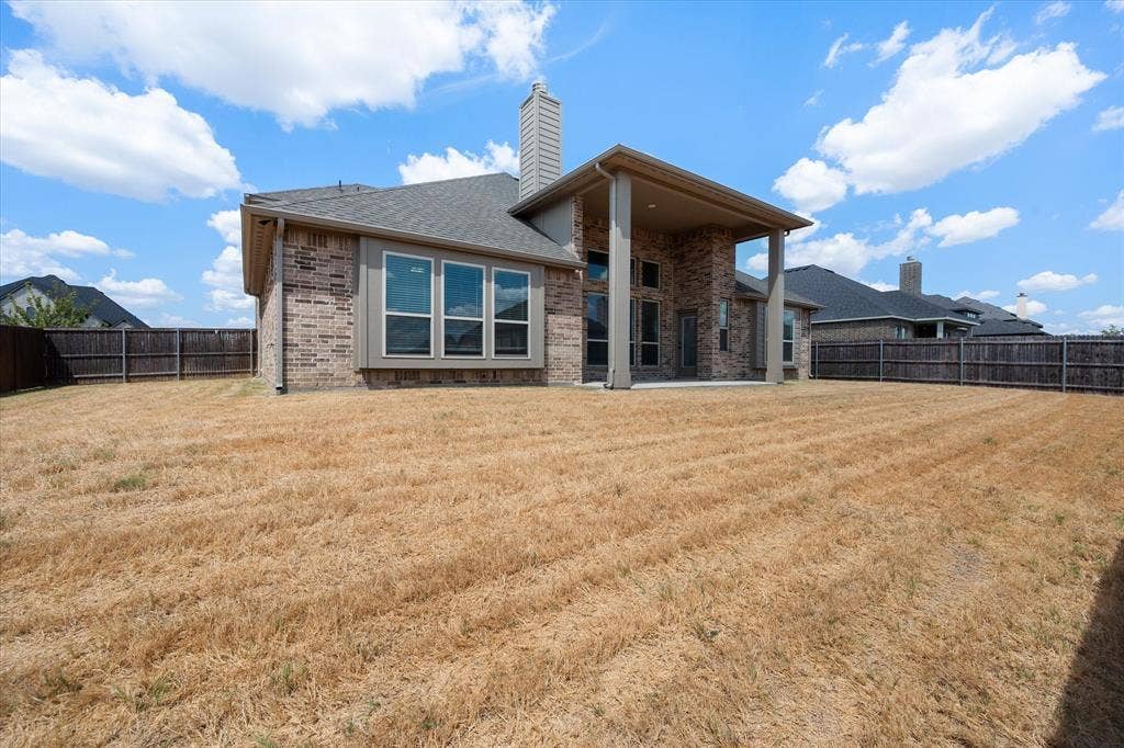 5626 Rutherford Drive, Midlothian, TX 76065 From this angle you get a feel for the lot size and how private the backyard is with privacy fencing all around.