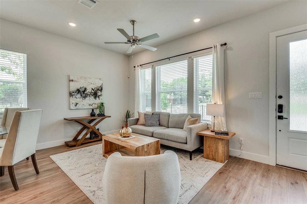 505 Mission Trail, #603, Arlington, TX 76010 Recessed lighting, ceiling fan, wood-finish flooring, multiple windows with blinds, and white interior door