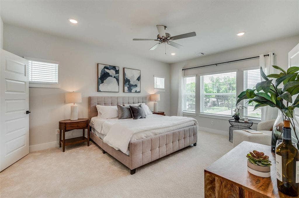 505 Mission Trail, #603, Arlington, TX 76010 Recessed lighting, ceiling fan, multiple windows with blinds, light-colored carpeting, and a white paneled door