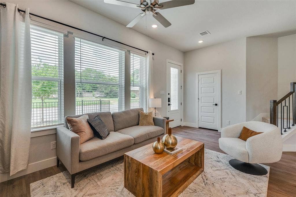 505 Mission Trail, #603, Arlington, TX 76010 Wood-finish flooring, recessed lighting, and a ceiling fan