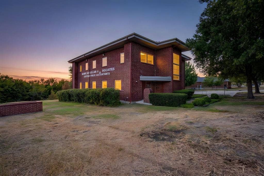 1415 E Belt Line Road, Carrollton, TX 75006 Brick exterior with multiple windows, architectural overhangs, and established landscaping