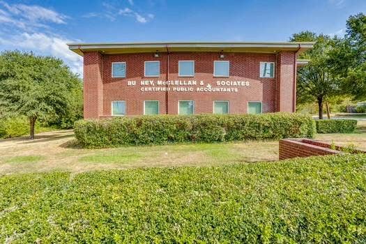 1415 E Belt Line Road, Carrollton, TX 75006 Brick exterior with multiple windows