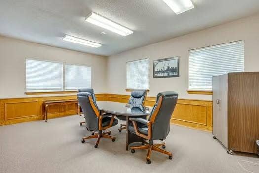 1415 E Belt Line Road, Carrollton, TX 75006 Wall paneling, multiple windows with blinds, recessed lighting, neutral carpet