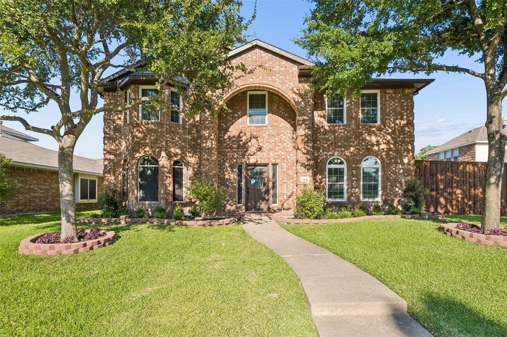 753 Summerfield Drive, Allen, TX 75002 Brick exterior with arched entry and bay window feature