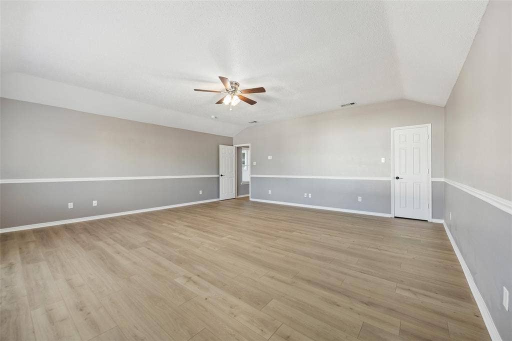 753 Summerfield Drive, Allen, TX 75002 Vaulted ceiling, ceiling fan, wood-finish flooring, two-tone wall paint, interior doors