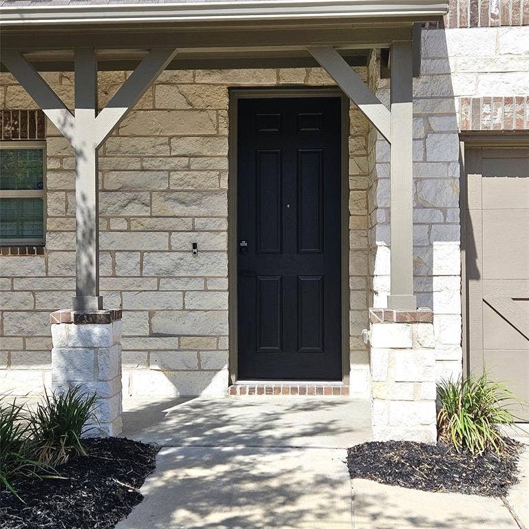 2225 Crooked Bow Drive, Mesquite, TX 75149 Stone veneer exterior with brick accents