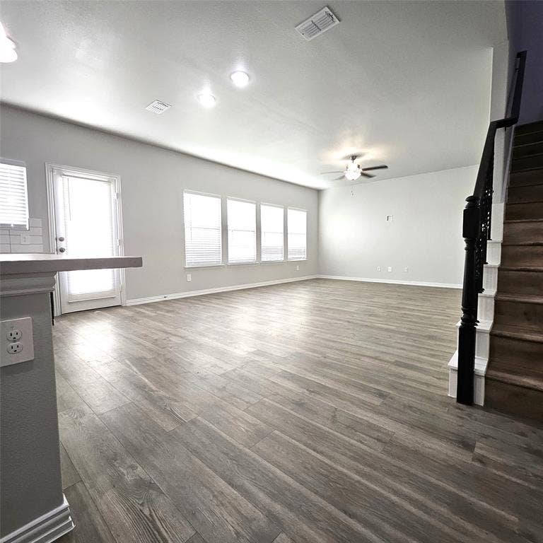 2225 Crooked Bow Drive, Mesquite, TX 75149 Spacious living area featuring wood-finish flooring, recessed lighting, and a ceiling fan