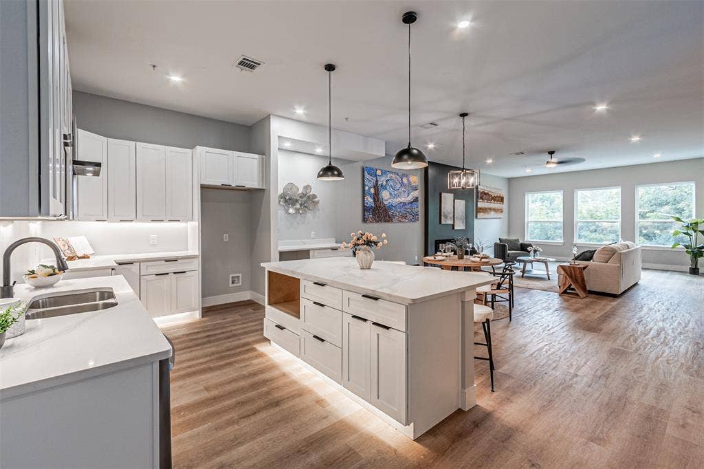 2376 Longhorn Street, #A,B,C,D, Dallas, TX 75228 THE KITCHEN ISLAND DOUBLES AS A BREAKFAST BAR
