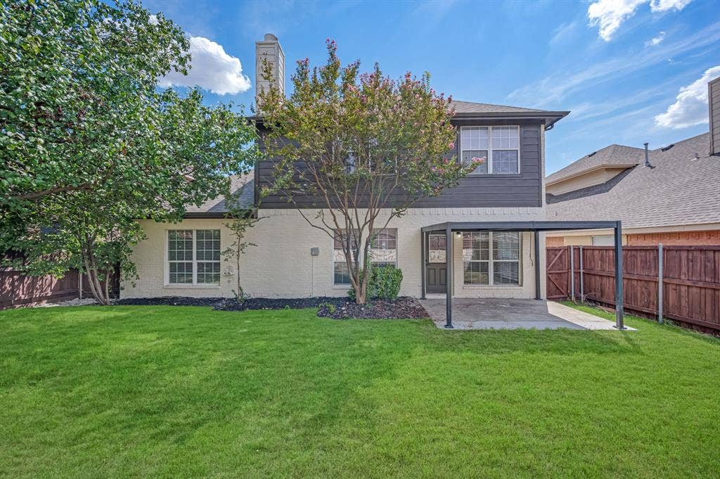 7904 Blacktail Trail, McKinney, TX 75070 Expansive lawn, covered patio, wood privacy fencing, and mature trees complement the exterior