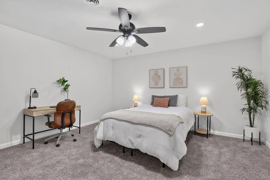 1204 Loma Alta Place, Cleburne, TX 76033 Recessed ceiling lighting, ceiling fan, and gray carpeting