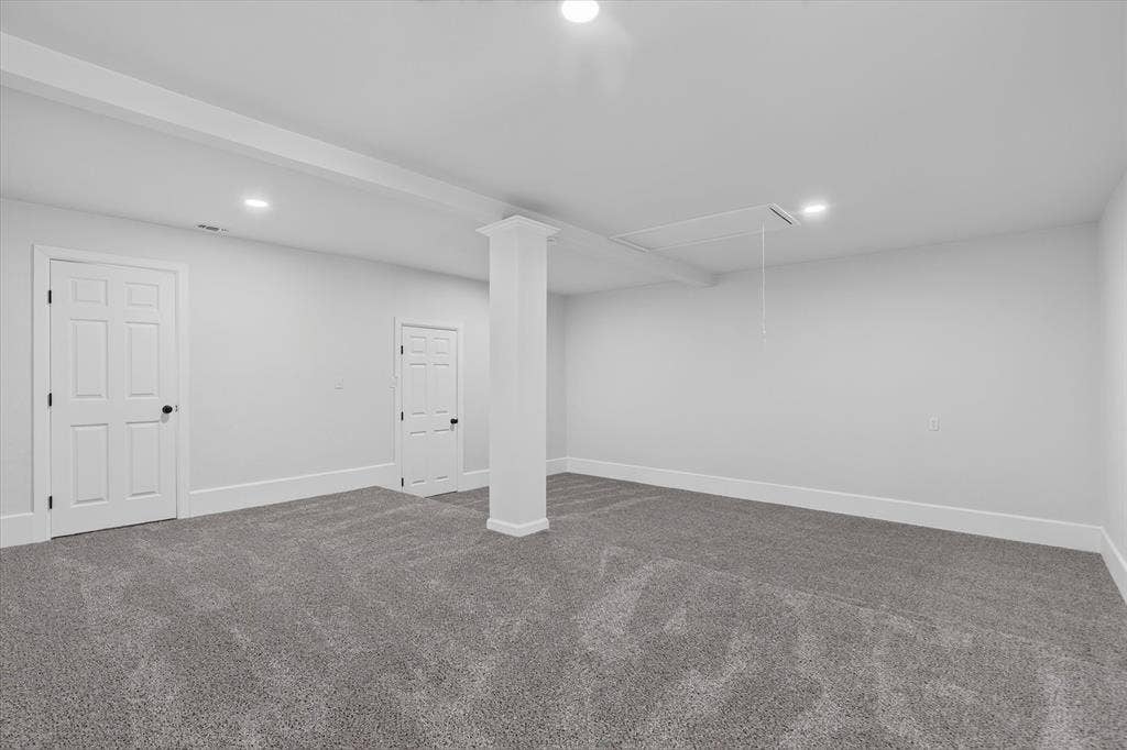 1204 Loma Alta Place, Cleburne, TX 76033 Spacious room featuring neutral carpeting, recessed lighting, and white paneled doors