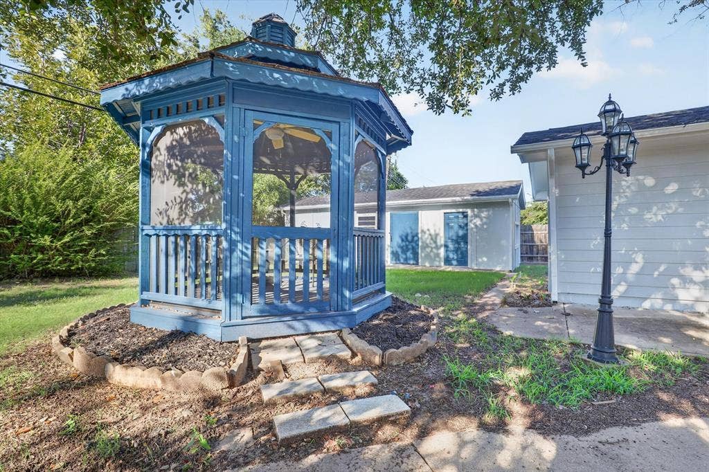 1204 Loma Alta Place, Cleburne, TX 76033 Blue gazebo featuring a cupola roof and screened sides