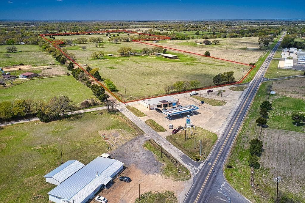 00 Tx-274 Highway, Kemp, TX 75143 Expansive land parcel featuring open fields and mature trees, with direct road frontage
