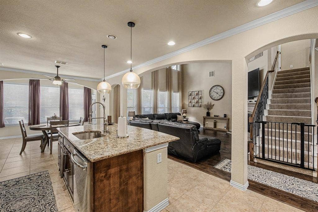 9939 Amberwoods Lane, Frisco, TX 75035 Eat-in Kitchen with Island, double ovens, gas cooktop and lots of storage!