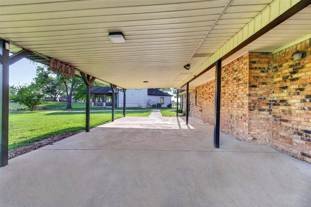 106 Snyder Ranch Road, Trinidad, TX 75163 Huge covered patio looks out to the back yard