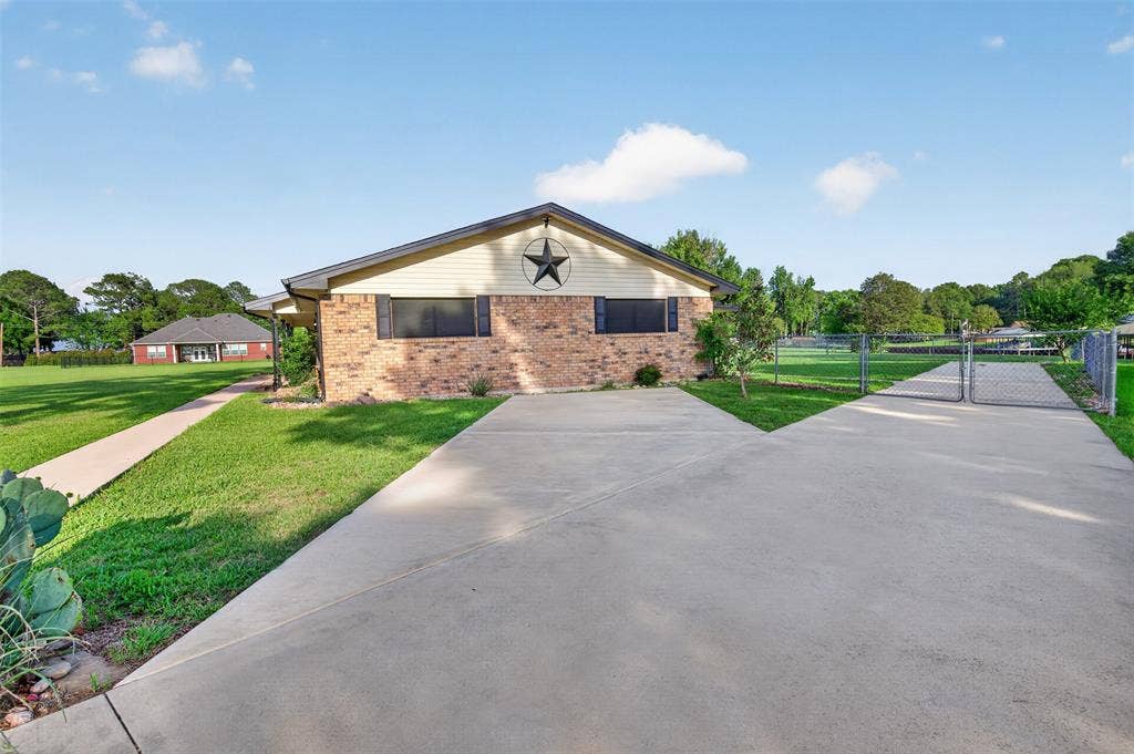 106 Snyder Ranch Road, Trinidad, TX 75163 View of the side of the home shows the ample parking