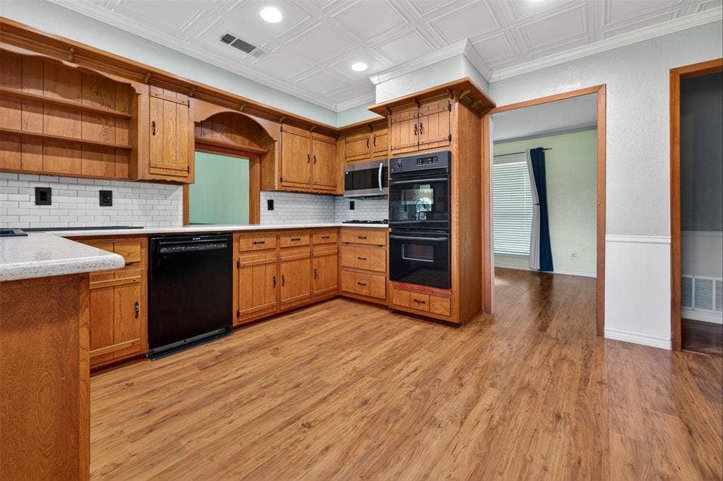 106 Snyder Ranch Road, Trinidad, TX 75163 The kitchen is at the heart of the home and has lots of counter space and tons of cabinets plus newer appliances and double ovens