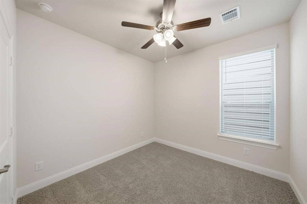 4532 Community Court, Plano, TX 75024 Wall-to-wall carpeting, ceiling fan with integrated lighting, and window with blinds