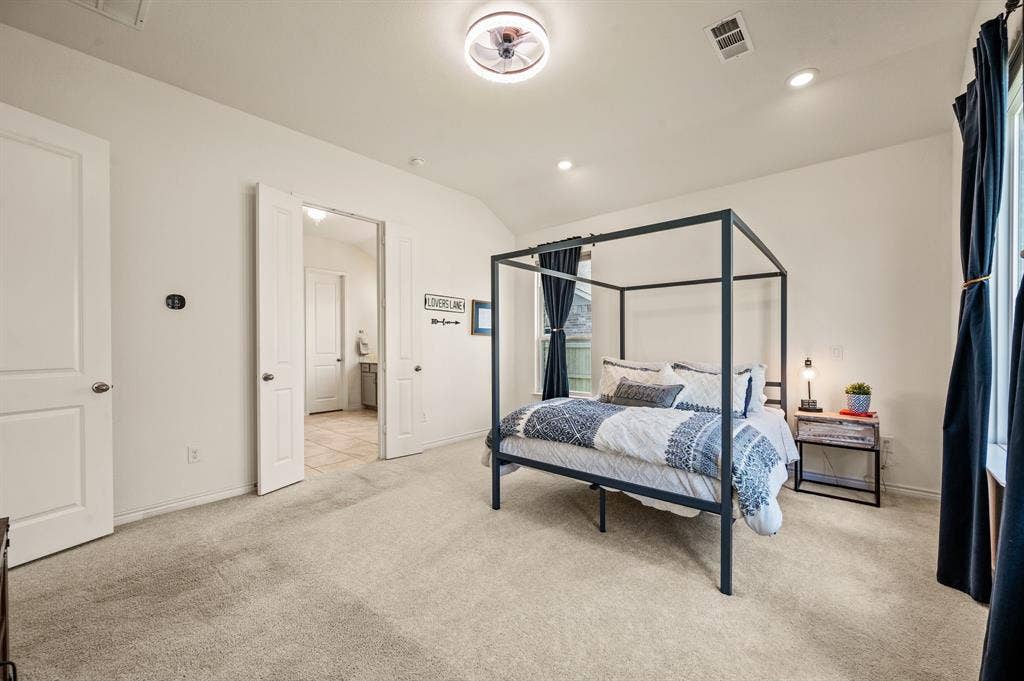 2900 Peekaboo Lane, Northlake, TX 76247 Large and bright primary bedroom with a fabulous ensuite bathroom. So much room for your large bedroom furniture, can you picture your stuff here?