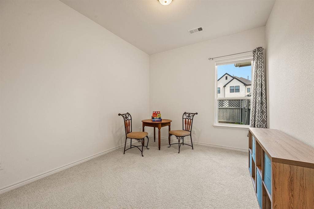 2900 Peekaboo Lane, Northlake, TX 76247 Great sized bedroom ready for your guests and family to enjoy. This bedroom has an ensuite bathroom.