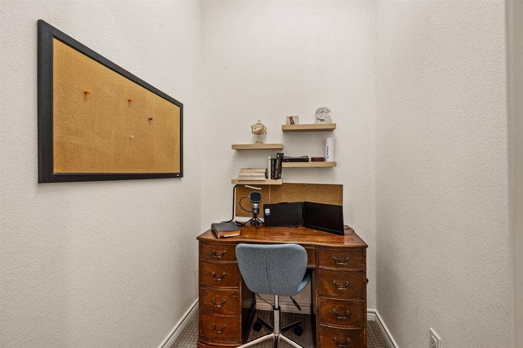 2900 Peekaboo Lane, Northlake, TX 76247 This is the additional storage area in the office that is currently being utilized as a small office space...Such a smart use of space!