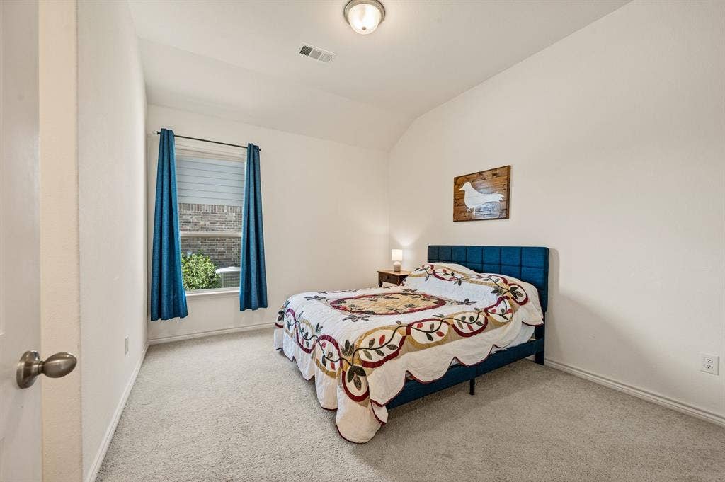 2900 Peekaboo Lane, Northlake, TX 76247 Great size guest bedroom with great lighting and well sized. Ready for family and friends.